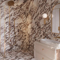 Novara Pavonazzetto marble effect porcelain tile 60 x 120cm shown in a room setting