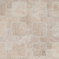 Close detail of the interlocking Casablanca shapes and softened tumbled edges in travertine