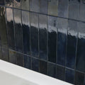 Lisbon Blue Cobalt Shine cobalt blue zellige-style brick tiles in an interior scheme