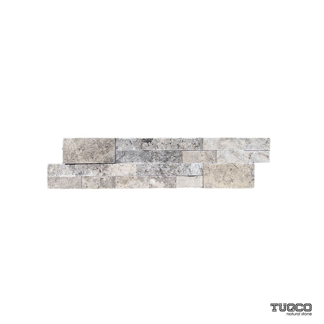 Silver travertine split face ledger panel in cool pewter grey with charcoal seams and stacked relief