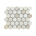 Sheet of rustic tumbled travertine hexagon mosaic showing softened edges and banded cream and brown stone