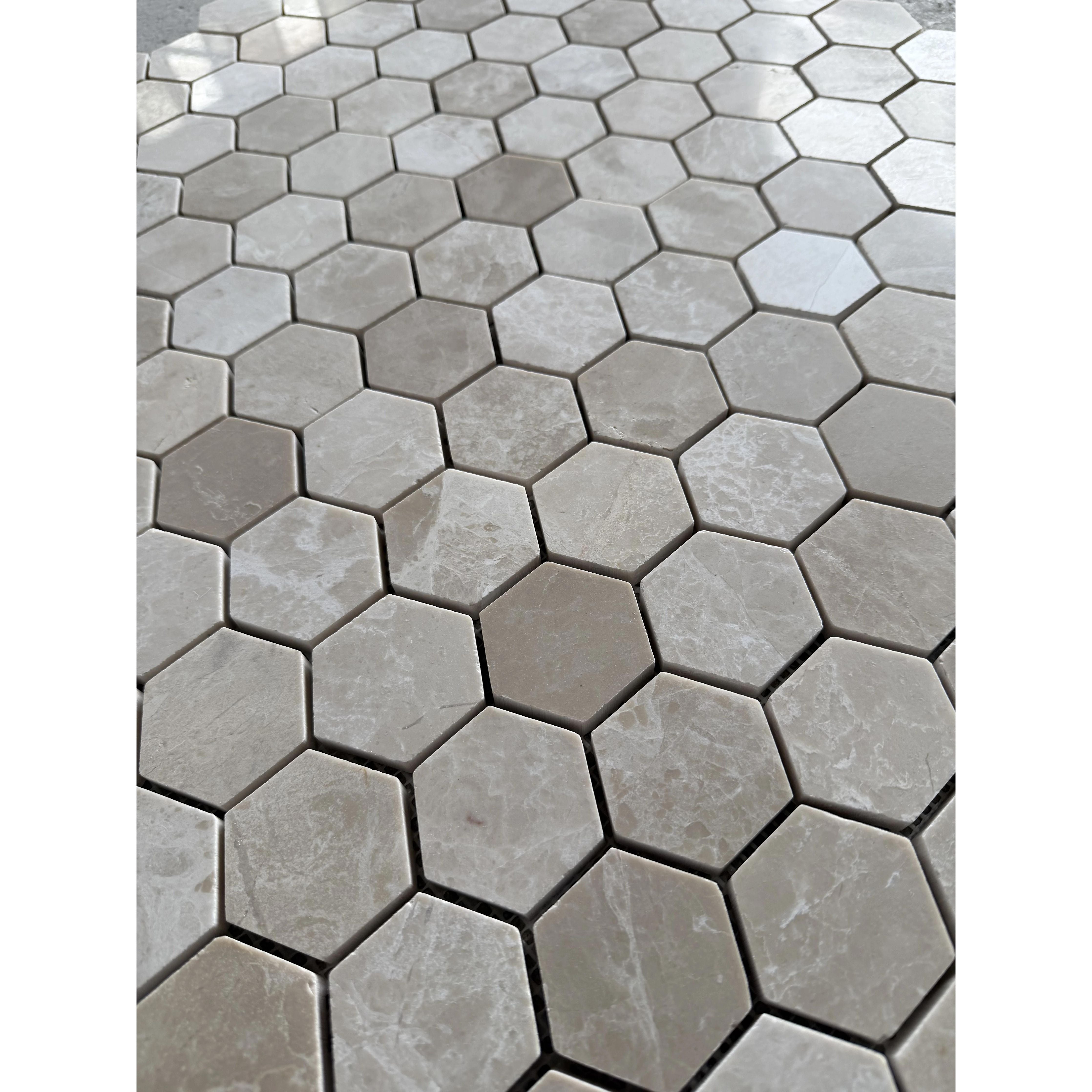 Belgravia Beige polished marble hexagon mosaic used on a bathroom wall