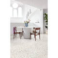 White cylindrical table brigg blue on cotton with smooth modern design and subtle vertical grooves