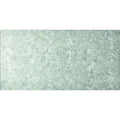 A large format 600 x 300mm rectangular antique mirror tile with distressed green mottled vintage patina finish
