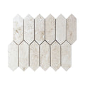 Cream limestone picket mosaic laid on a bathroom wall with matching pale grout