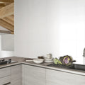 Brilliant White Tabia Bianco Matt Rectified 29.8 x 59.8cm ceramic tile room setting