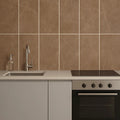Creekstone Taupe 29.7 x 59.7cm porcelain stone-effect tile room setting
