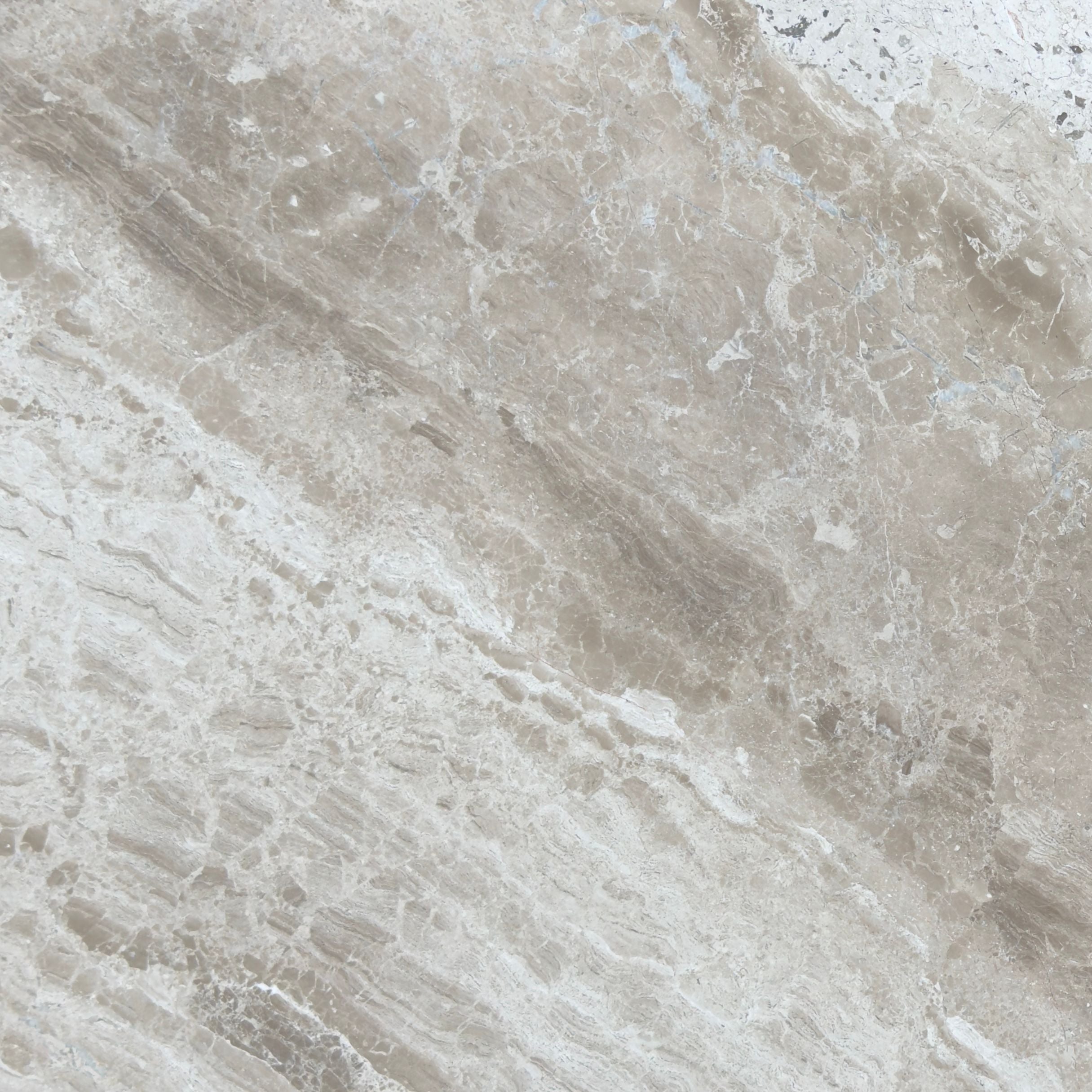 Diana Royal honed marble tile in warm beige with fine darker veining