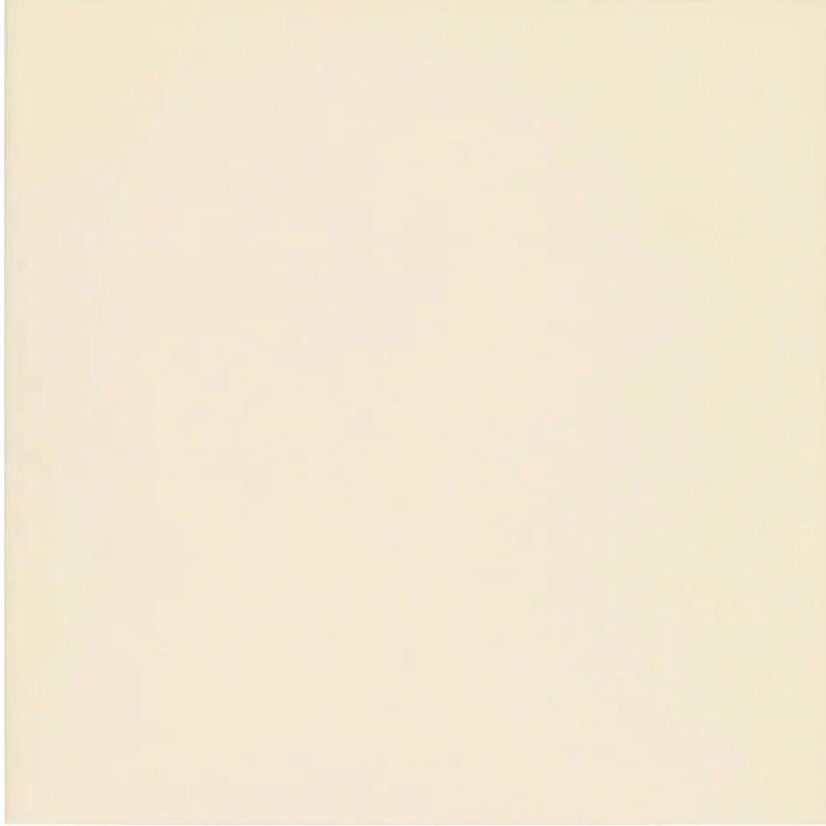 Solid cream-colored surface of abbey ivory tile showcasing smooth ceramic finish for interior wall applications