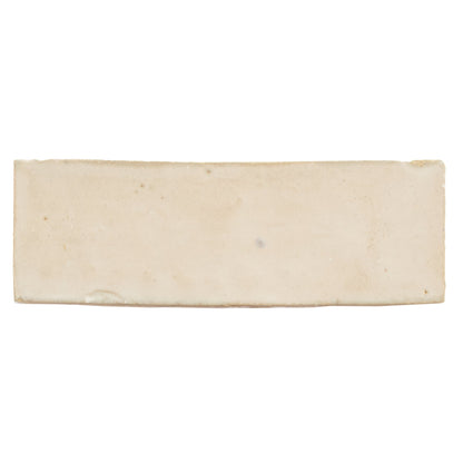 Cream-colored rectangular ceramic Medina cloudy white handmade Moroccan zellige tile with matte finish and natural imperfections