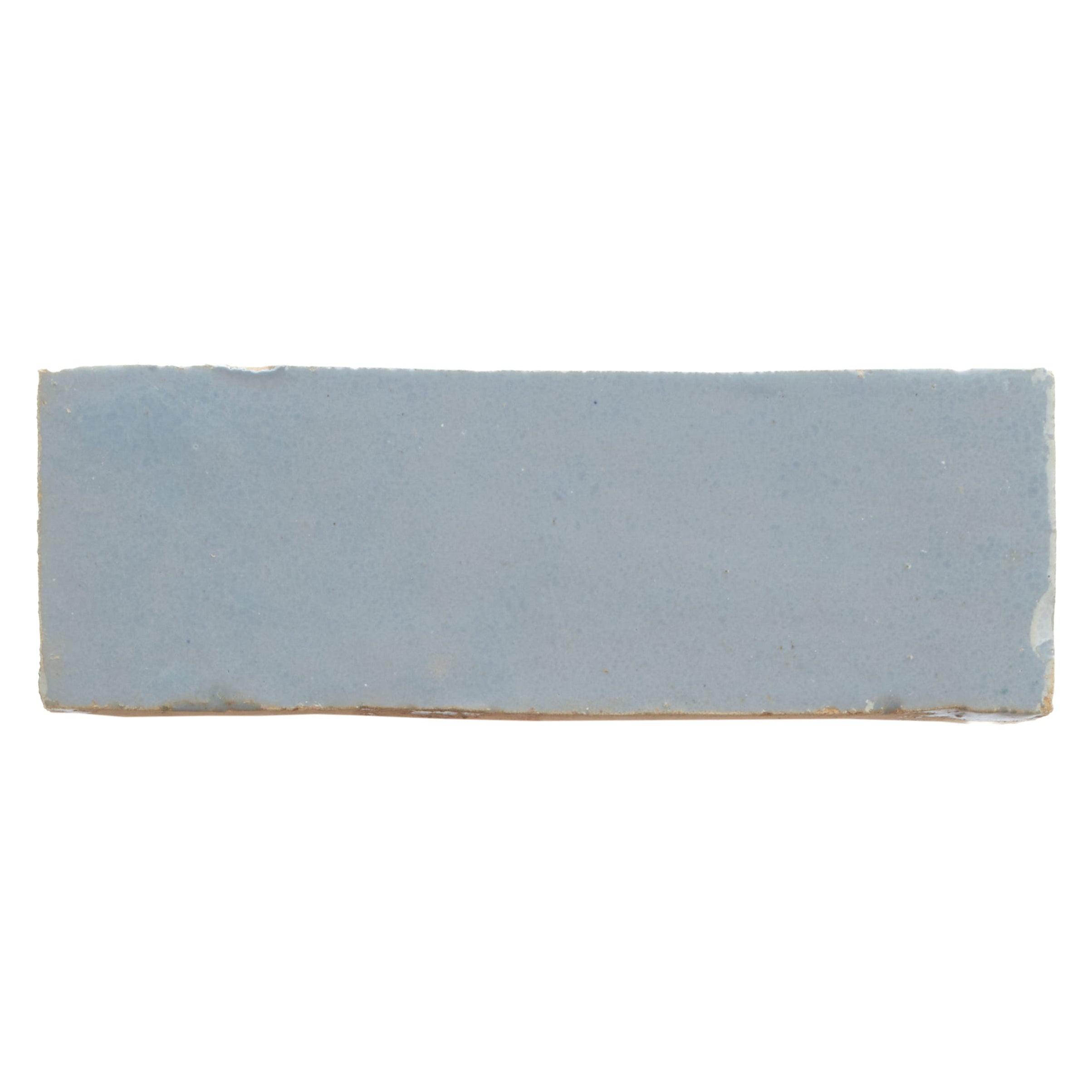 Medina cornflower blue rectangle handmade Moroccan zellige tile in matte light blue ceramic with earthy undertones and uneven edges