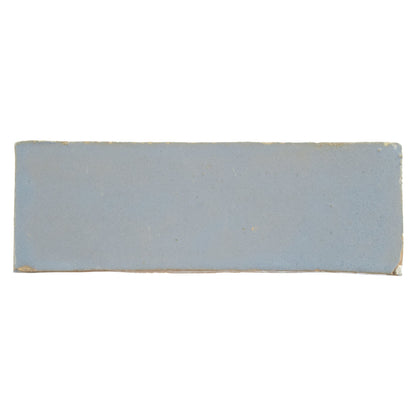 Medina cornflower blue rectangle handmade moroccan zellige tile in light gray ceramic with matte finish and uneven edges