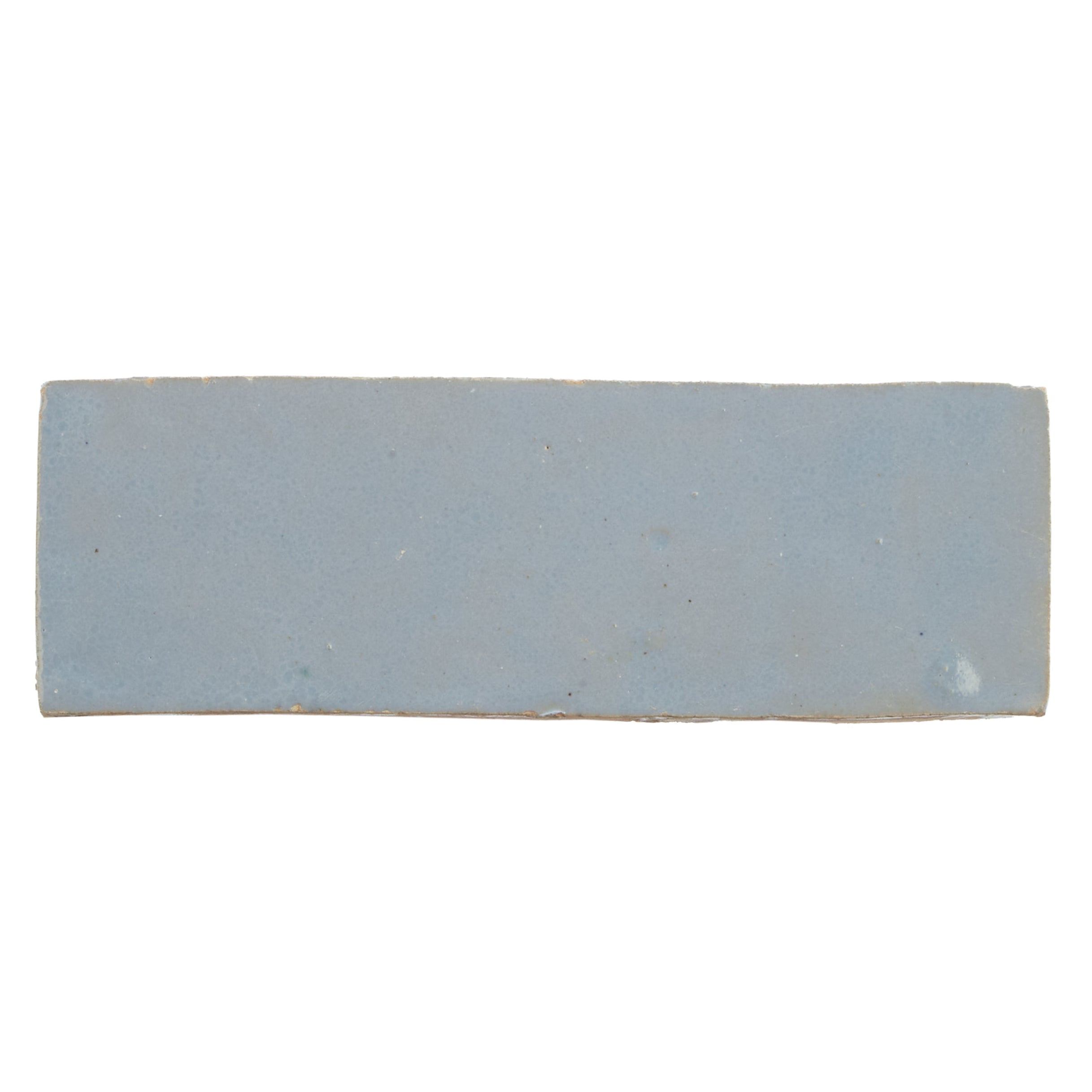 Medina Cornflower Blue rectangle handmade Moroccan zellige tile in matte light gray ceramic with subtle surface imperfections