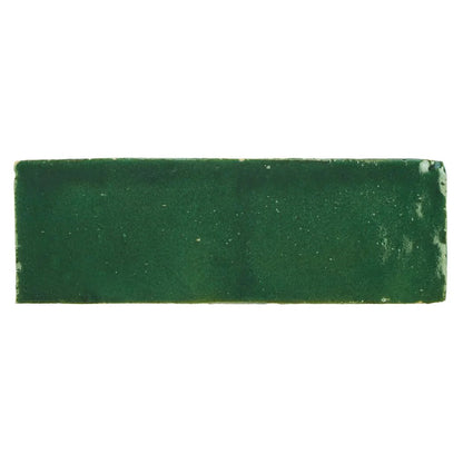 Medina moss green rectangle handmade Moroccan zellige tile with deep green color textured ceramic surface and white speckles