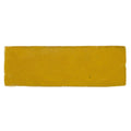 Medina ochre rectangle handmade moroccan zellige tile featuring a solid yellow rectangular bar of soap with textured surface