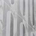 Byzantine porcelain palation sculpted gray and white marble-effect tiles with modern geometric vertical strips and arched cutouts