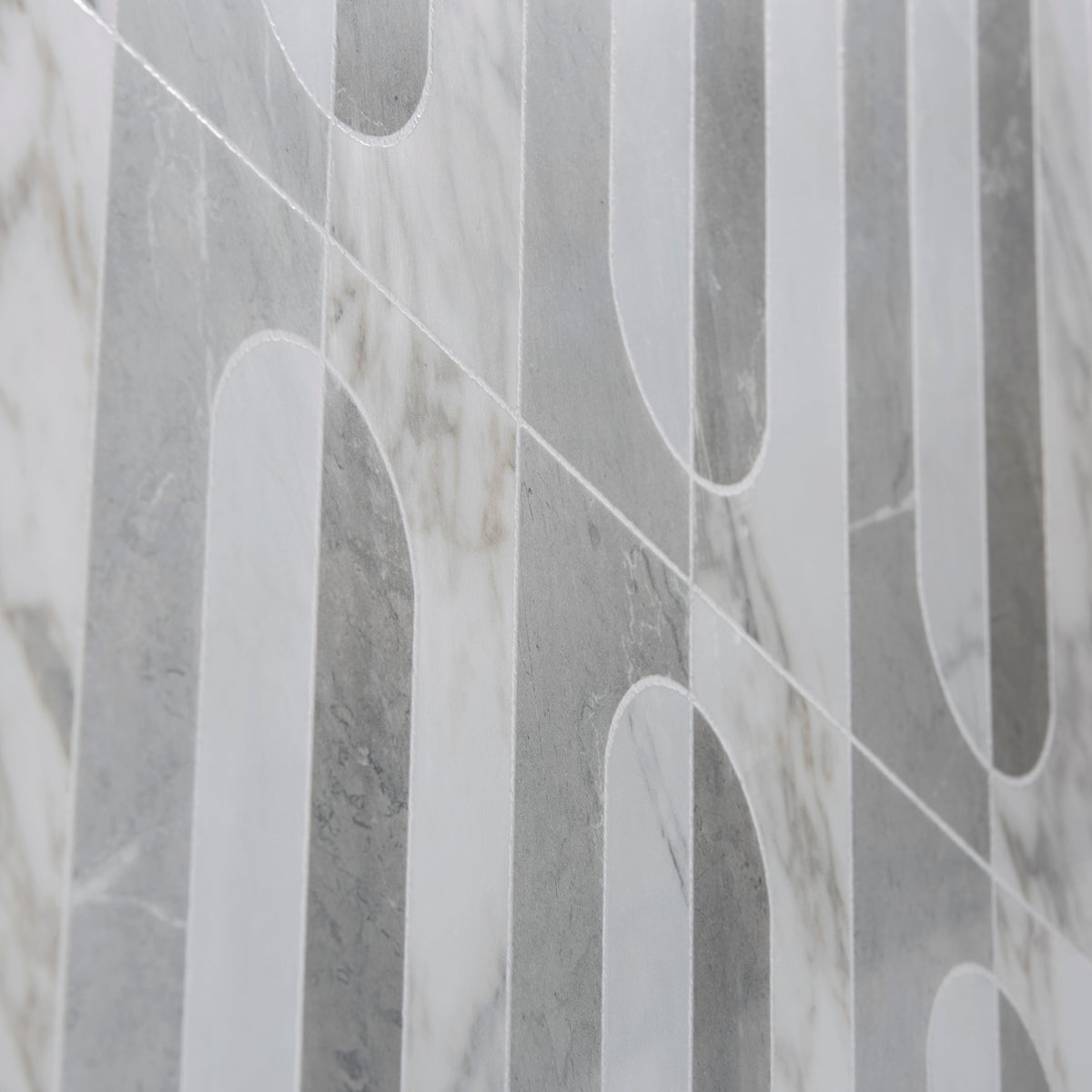 Byzantine porcelain palation sculpted gray and white marble-effect tiles with modern geometric vertical strips and arched cutouts