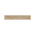 Pale Sycamore wood effect plank tiles laid across a kitchen floor, Fired Earth Cotswold