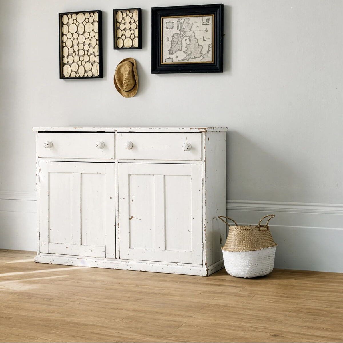 Roomset showing Cotswold Oak warm wood effect plank tiles in a styled interior