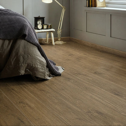 Roomset showing Cotswold Walnut rich dark wood effect plank tiles in a styled interior