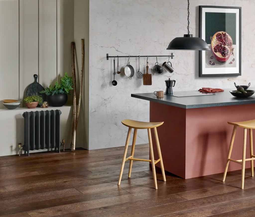 The engineered wood planks in this kitchen are Chepstow Distressed Charcoal Oak by Woodpecker and available from Hyperion Tiles