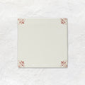Country Delft Beatrix Burgundy ceramic wall tile with a burgundy floral pattern