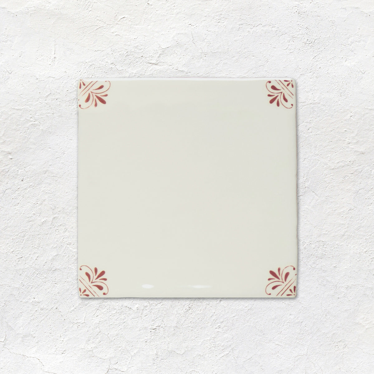 Country Delft Beatrix Burgundy ceramic wall tile with a burgundy floral pattern