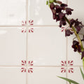 Country Delft Cornelia Burgundy tile showing its detailed burgundy floral design