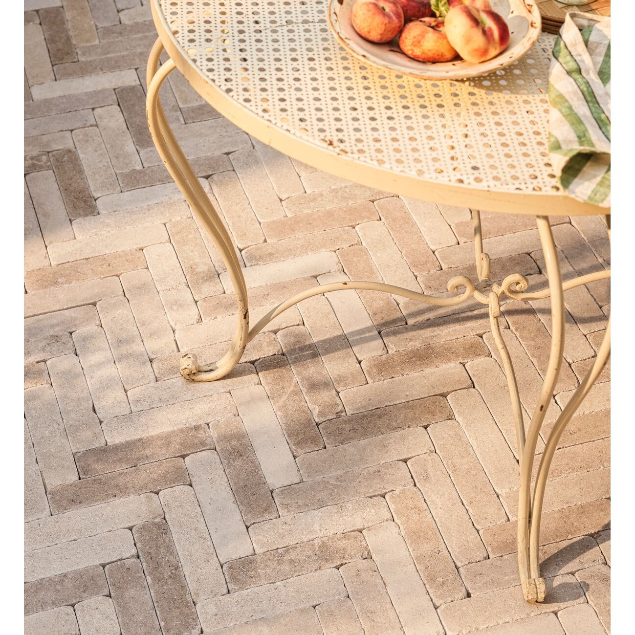 Dijon tumbled limestone 20 x 5cm cream and beige natural stone cobbles in a room setting