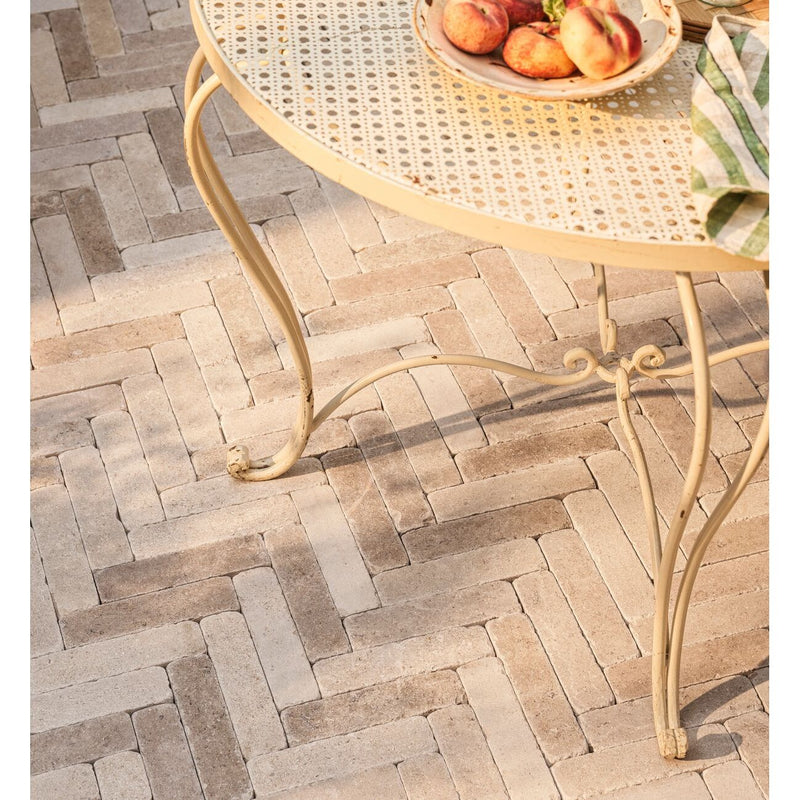 Dijon tumbled limestone 20 x 5cm cream and beige natural stone cobbles in a room setting