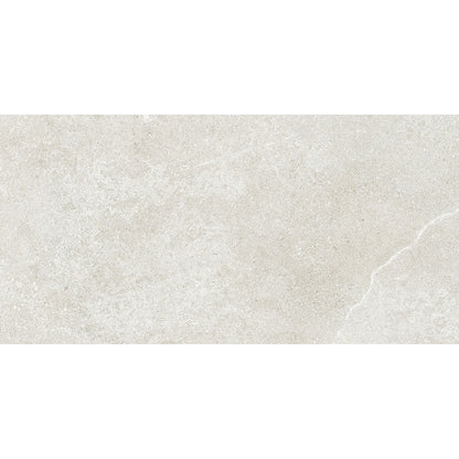 Beige textured ceramic tile with a subtle natural stone finish from dorset porcelain white collection