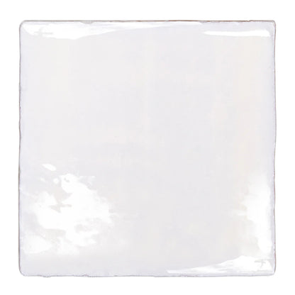Glossy white ceramic english delft blue gloss base tile with slightly uneven edges and subtle sheen