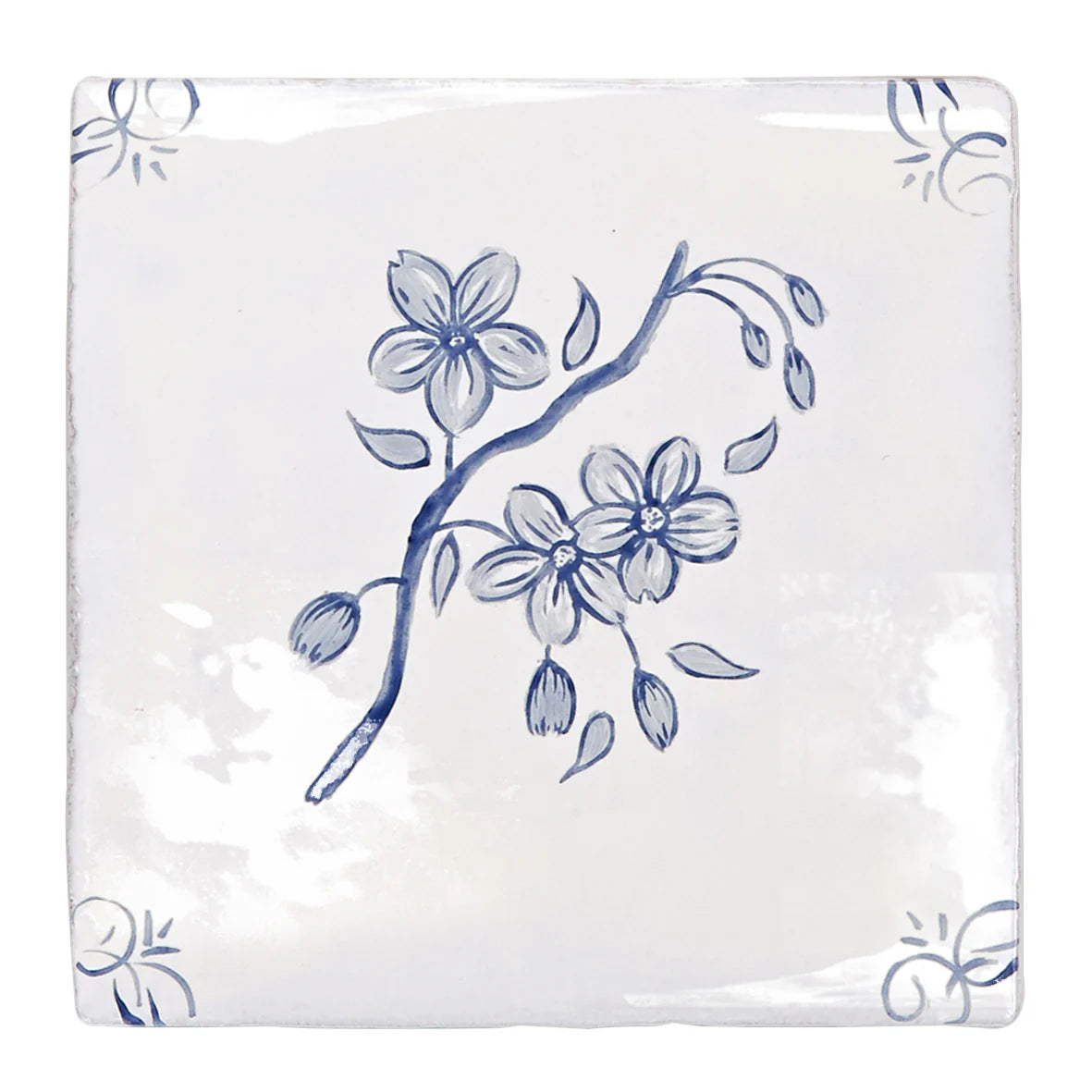 White ceramic coaster with delicate blue floral blossoms and buds on a branch english delft blossom blue gloss tile