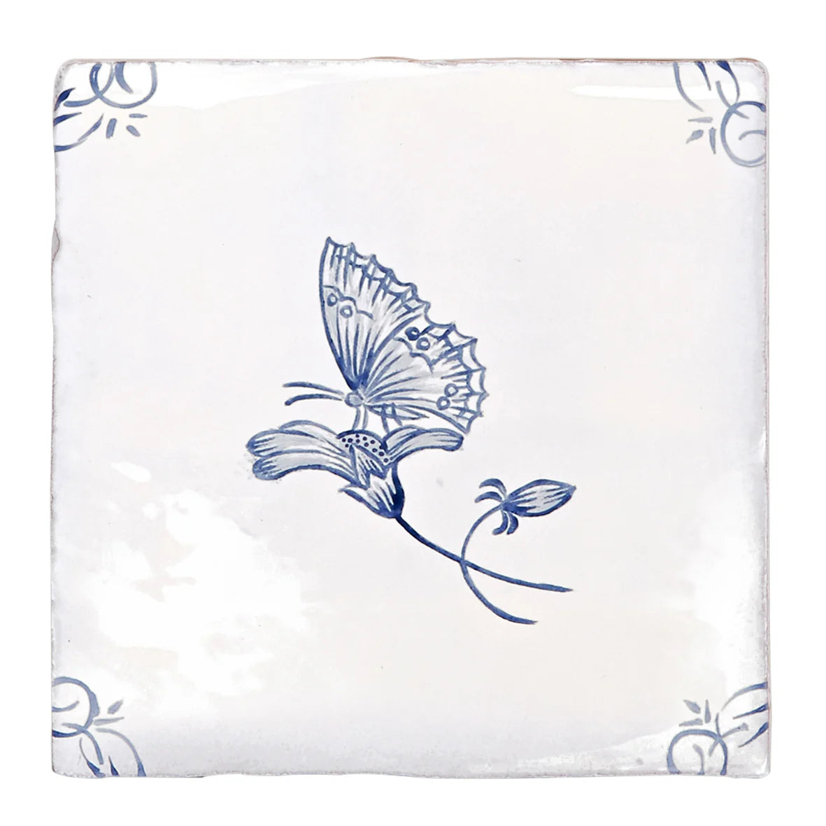 White ceramic coaster featuring a delicate blue hand-painted butterfly on a flower with ornate corner motifs english delft