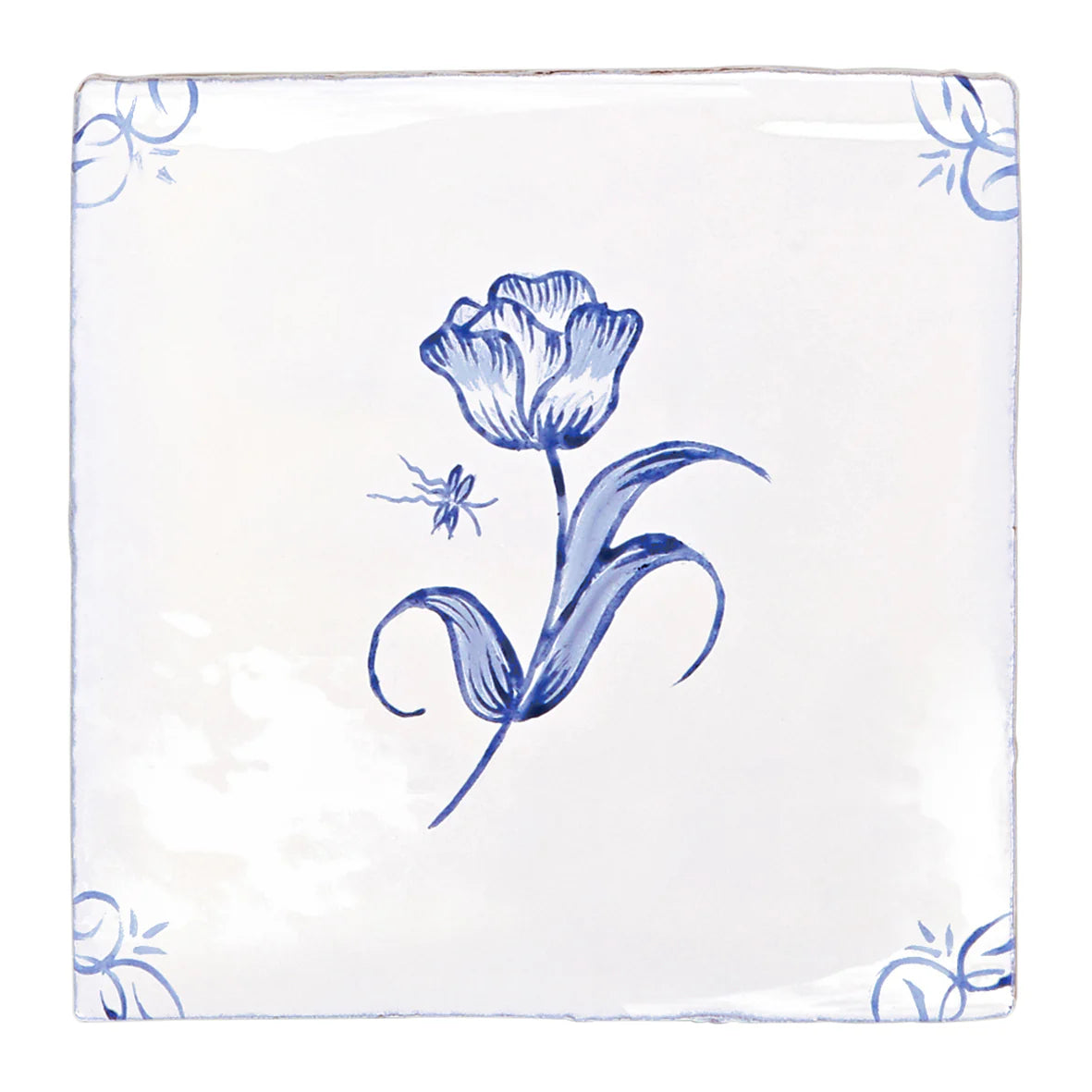 A white ceramic English Delft tulip blue gloss tile with delicate hand-painted blue tulip and corner floral motifs