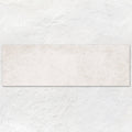 Cream-colored rectangular eastern mist stone coordinating single tile with subtle textured surface resembling natural stone