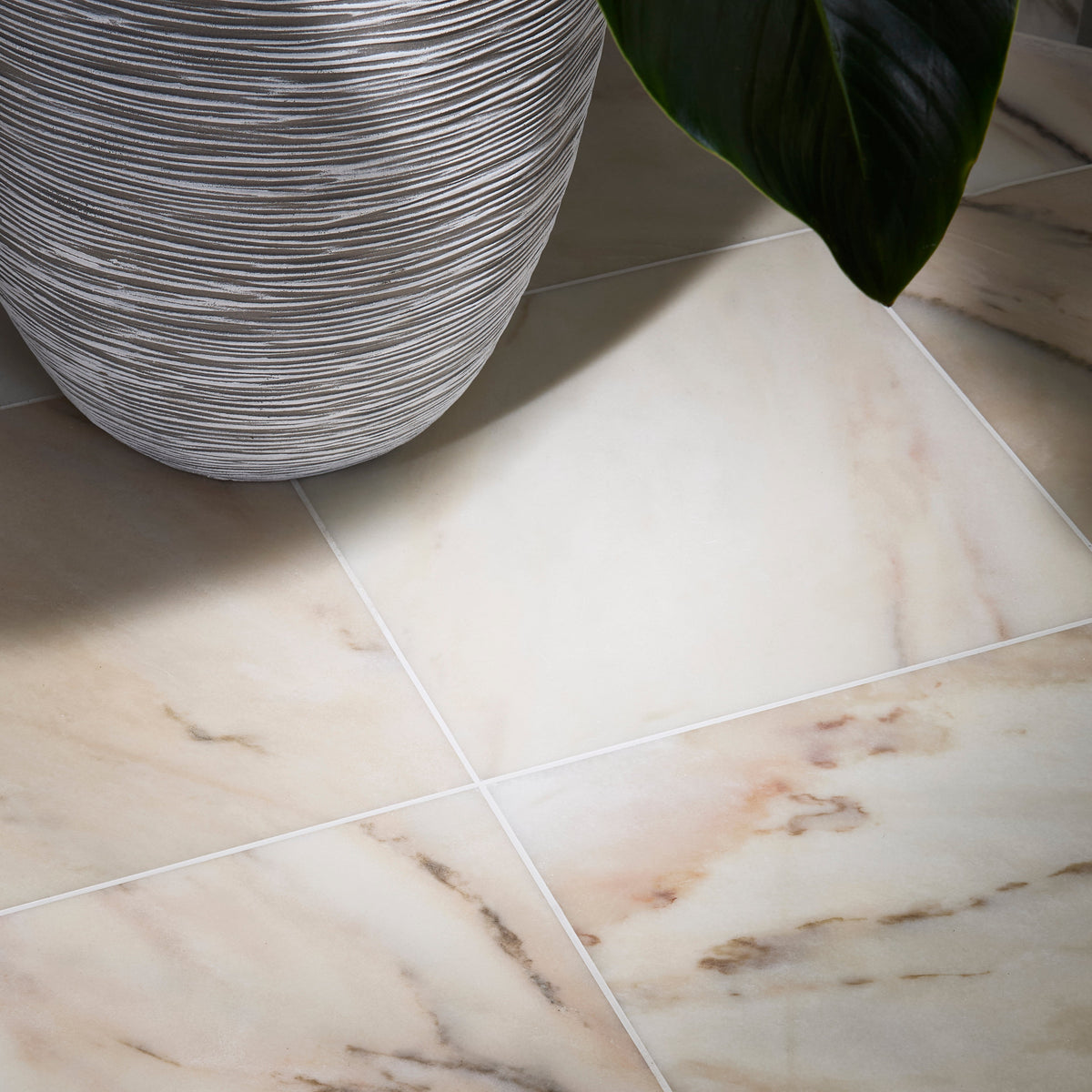 Elixir Marble Cashmere honed cream-colored marble floor tiles with subtle beige and gray veining