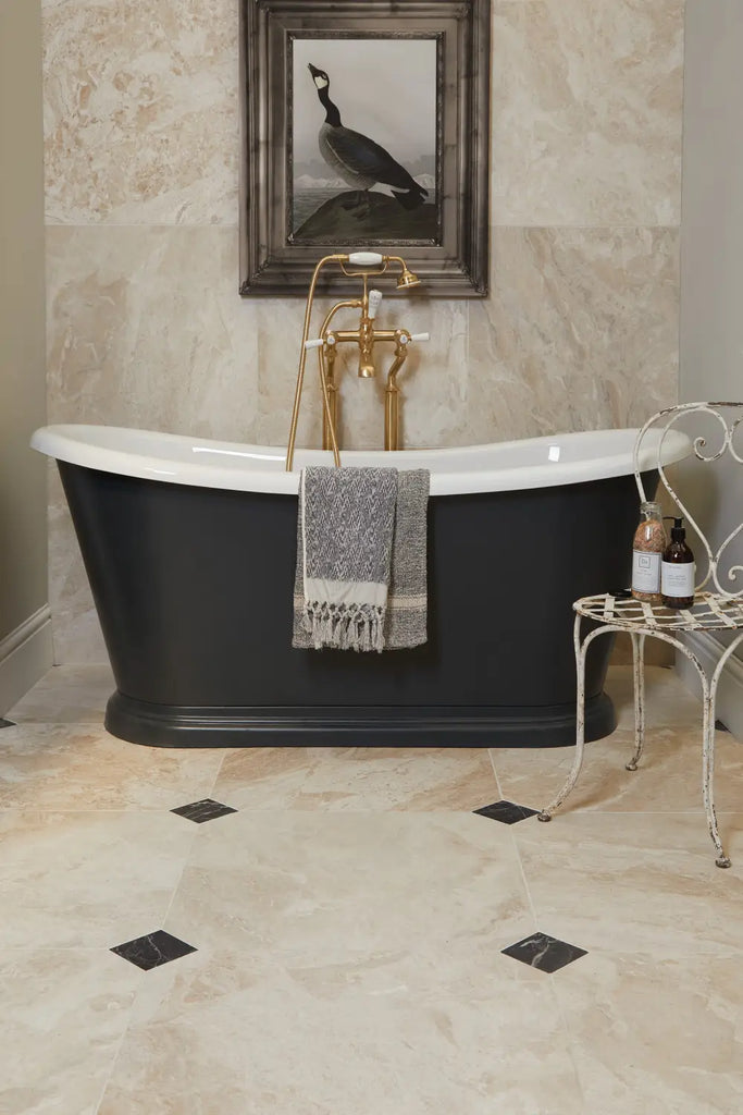 Various earthy tones in bathroom with Empress Marble Honed tiles stocked by Hyperion Tiles
