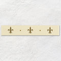 Fleur de Lis Border Gold on County White, a gold lustre fleur-de-lis border on a cream ceramic ground