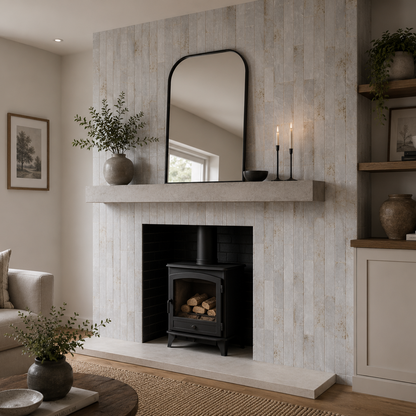 Genesi Pearl Brillo 4.8 x 45cm pearl grey brick tiles on a fireplace surround