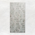 Eden Pergola 60x30cm rectangular wall tile with subtle muted gray leaf pattern on a light textured surface