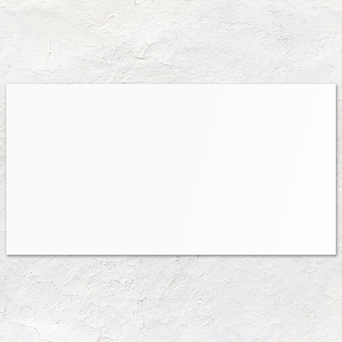 A plain white rectangular ice white rectified ceramic cardstock sheet measuring 60x30 centimeters