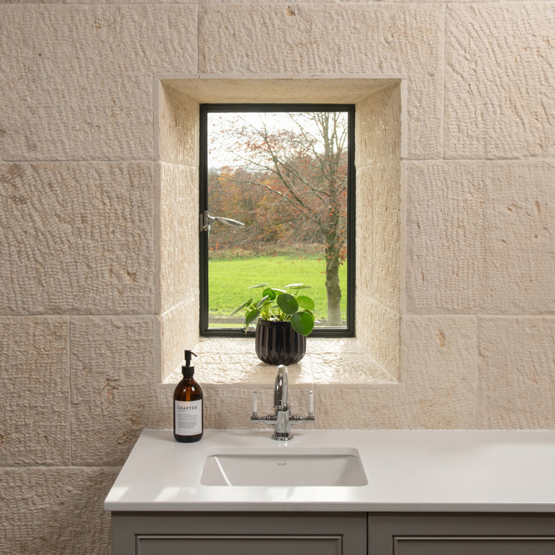 Biblical Ivory Textured 40cm x Random Length Wall Tile in a room setting