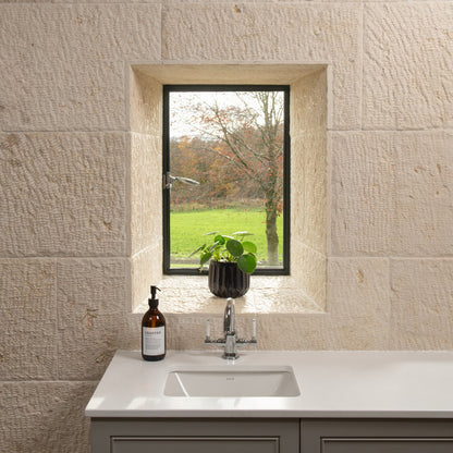 Biblical Ivory Textured 40cm x Random Length Wall Tile in a room setting
