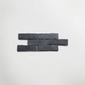 Bordeaux Black Parquet Tumbled 25 x 7cm Wall & Floor Tile in a room setting