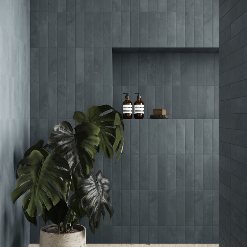 Ceren Mini Blu Polished 6 x 24cm Wall Tile in a room setting