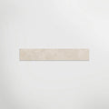 Elements Limestone Hauteville Cream Matt 90 x 7.5cm Skirting in a room setting