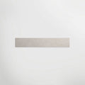 Illusion White Honed 90 x 7.2cm Skirting in a room setting