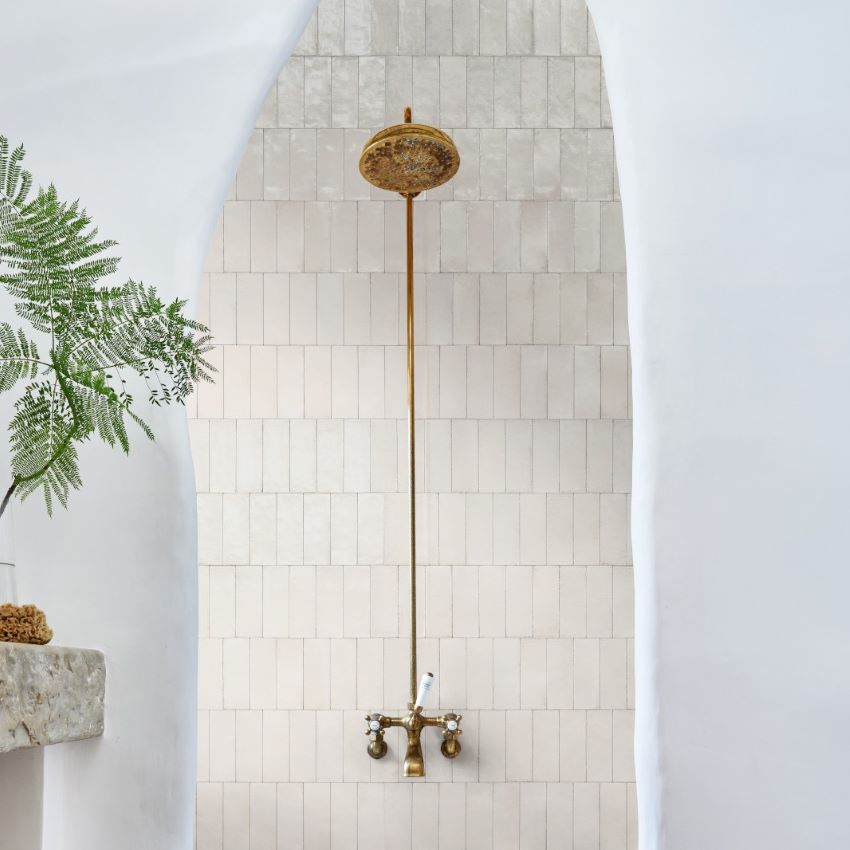 Qualis Rice Natural Polished 15 x 5cm Wall & Floor Tile in a room setting