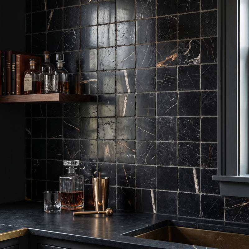 Sahara Noir charcoal marble squares with white and bronze veining